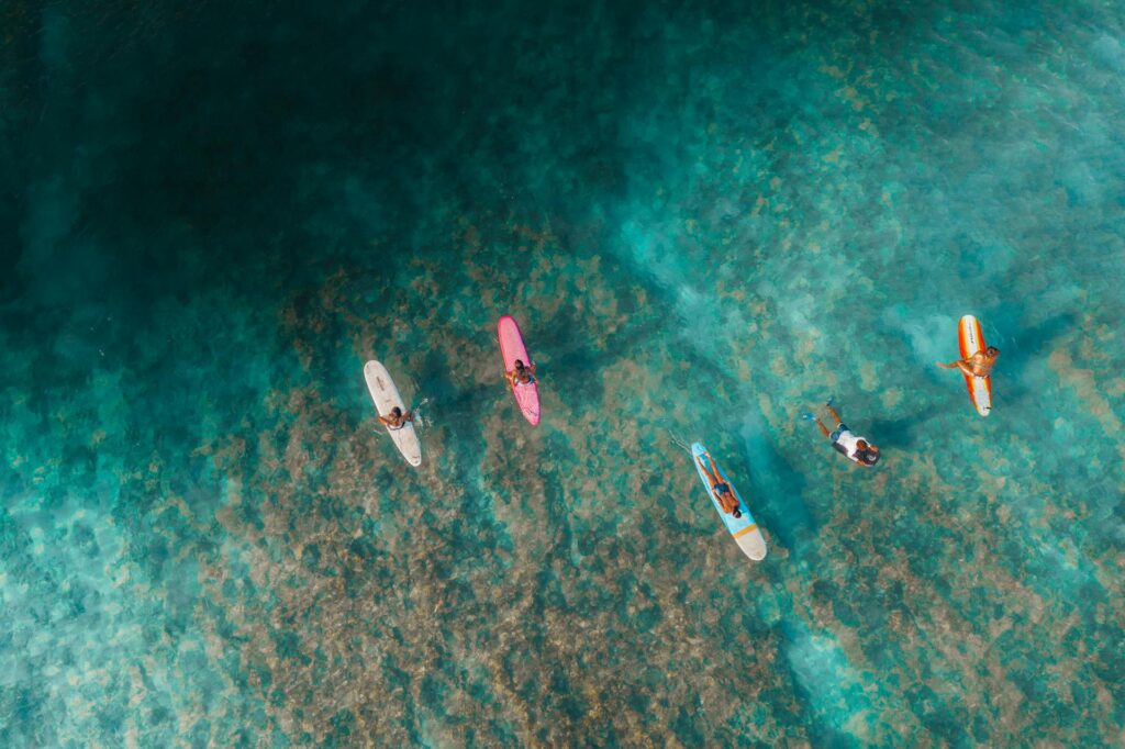 Tourists Paddleboarding on the mediterranean